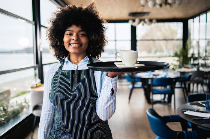 Waitress holding a tray