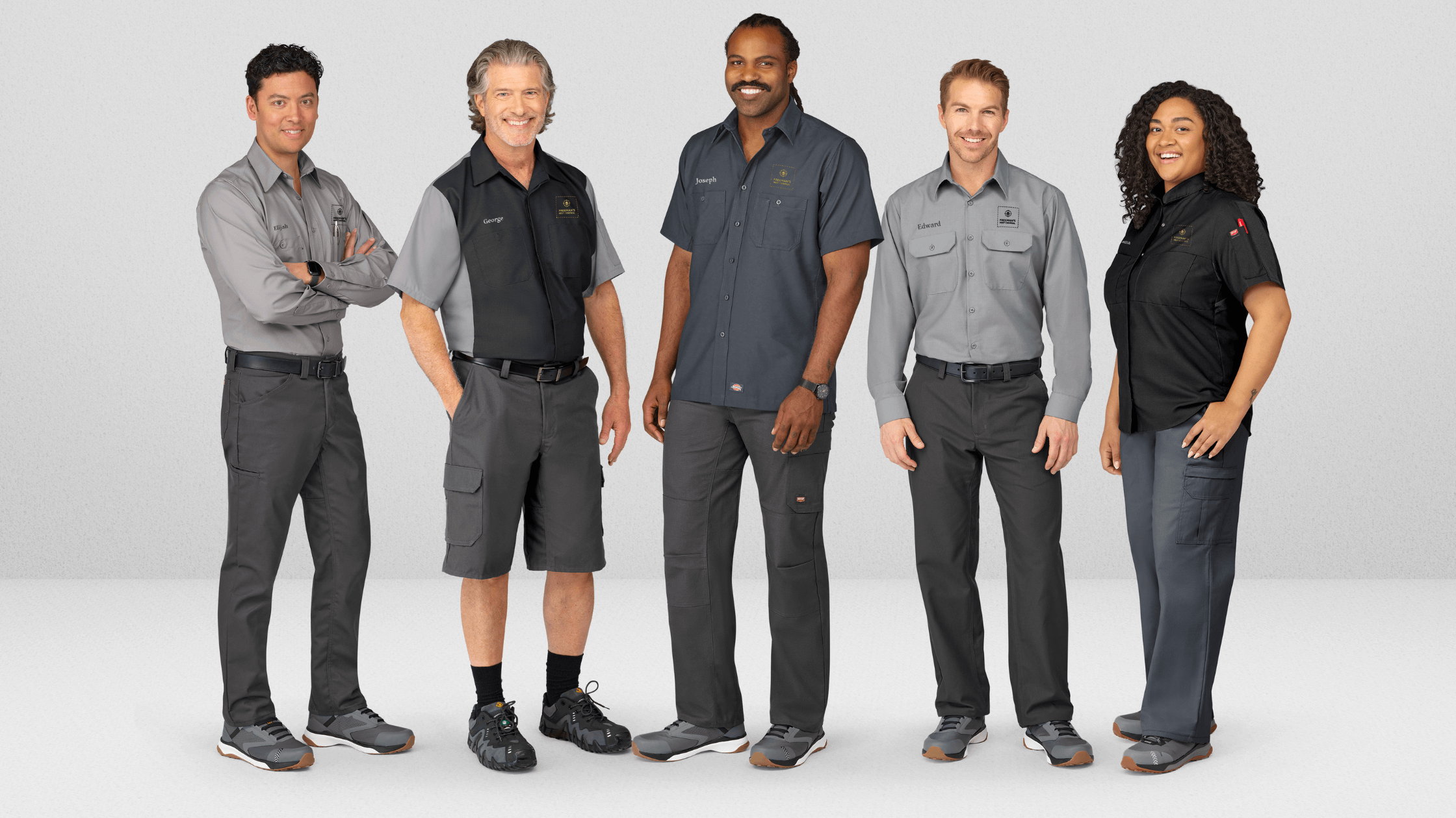 A diverse group of employees wearing well-fitted, professional uniforms and branded apparel, representing a team dressed in high-quality corporate uniforms from a trusted uniform provider.