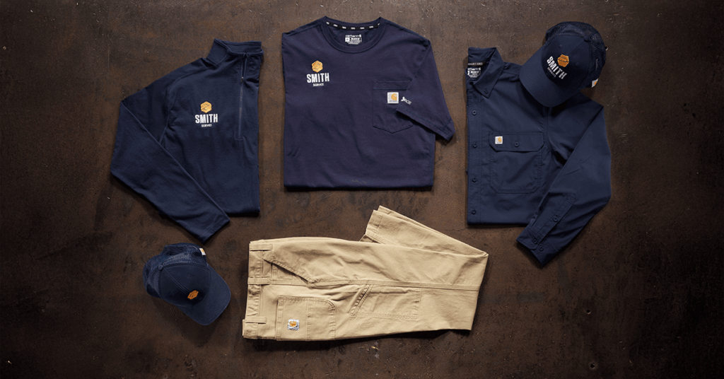 Labeled uniform kits for employees prepared for scalable distribution