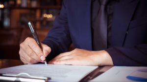 Procurement manager reviewing a uniform program contract before signing